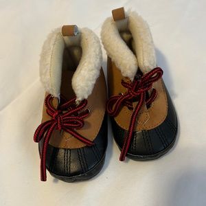 Carter’s 3-6 months boots. NEW